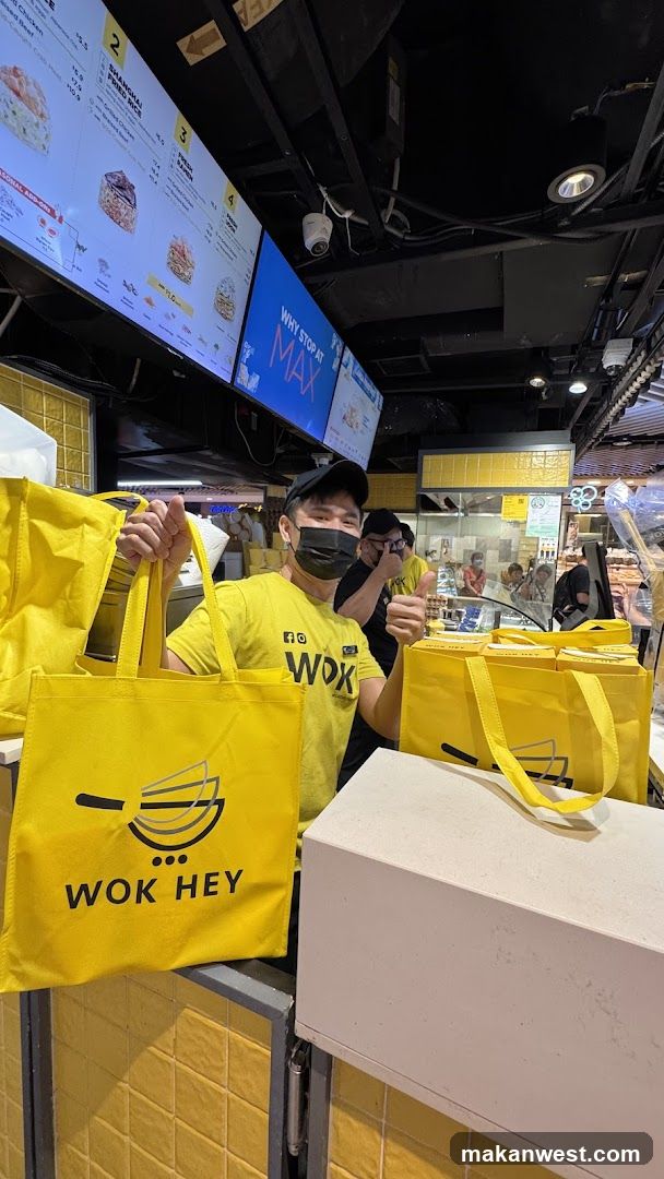 Wok Hey Staff with Yellow Tote Bags