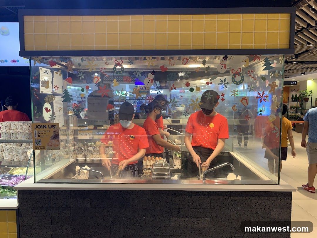 Food Stall with Staff Preparing Food