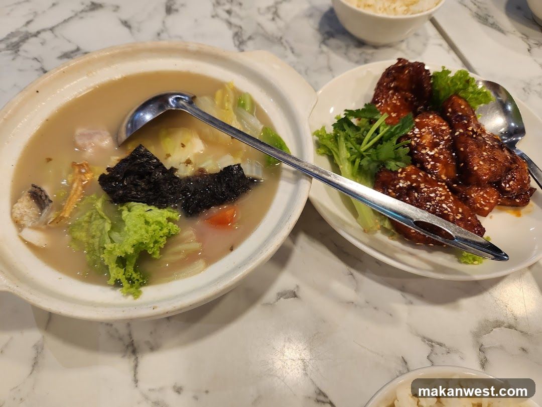 Dish with soup and fried chicken