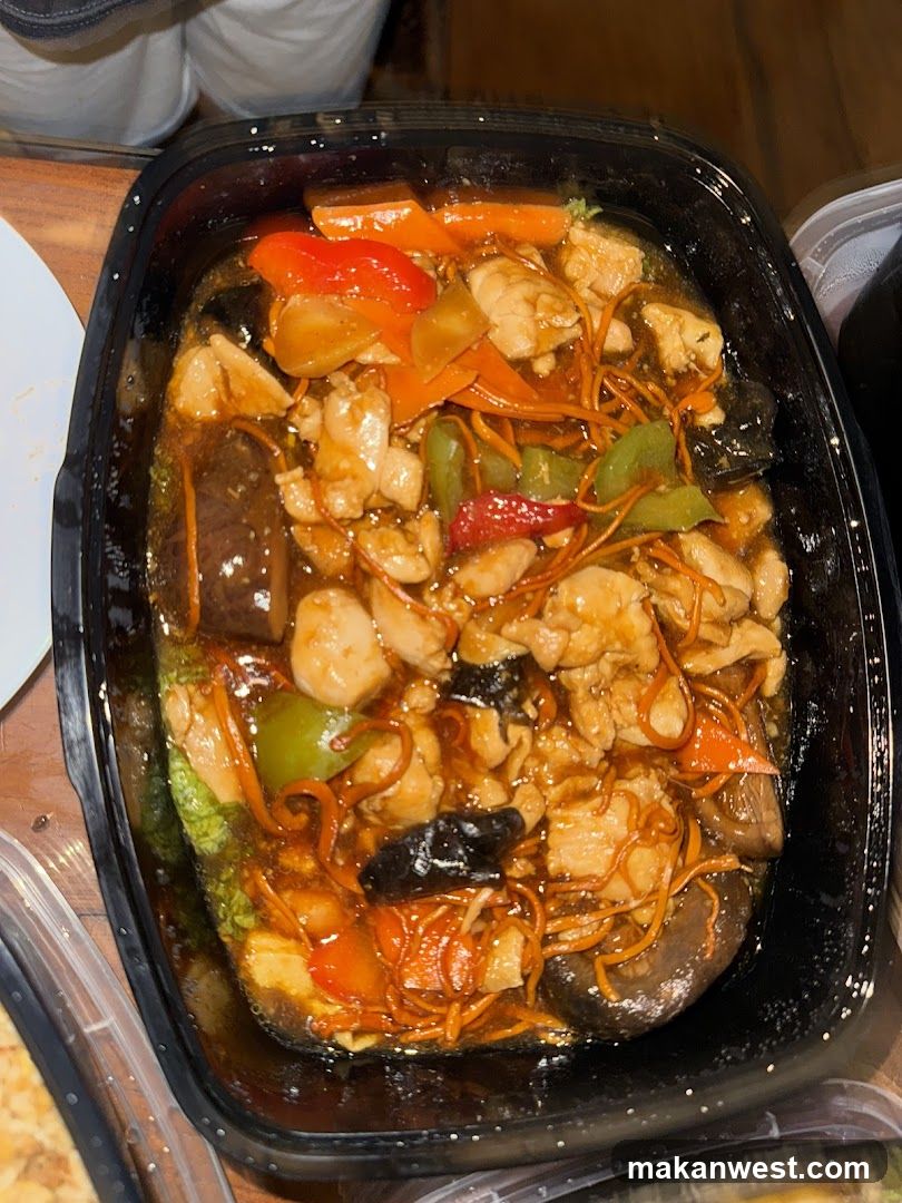 Stir-fry dish in takeout container