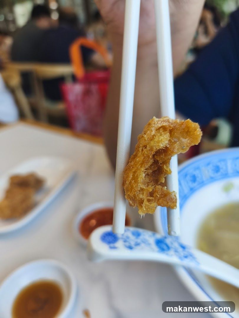 Chopsticks Holding Fried Food