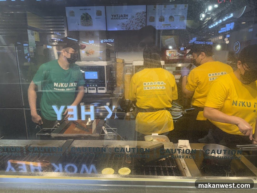Restaurant Staff Behind Counter
