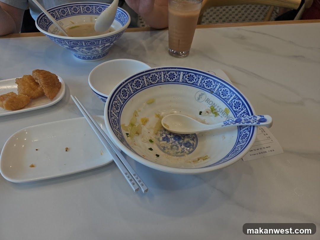 Empty Bowls and Leftovers at Restaurant Table