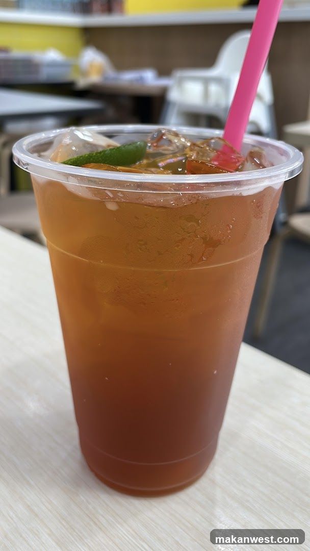Iced Tea with Lime and Pink Straw