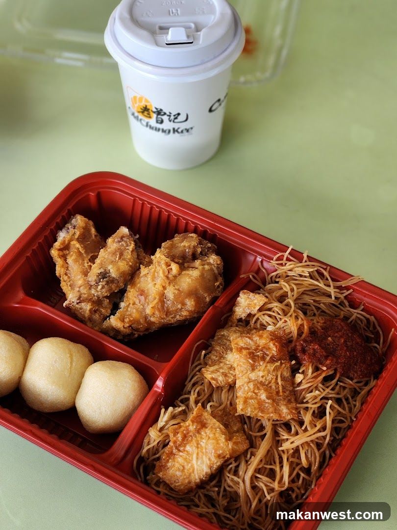 Food Container with Fried Chicken and Noodles