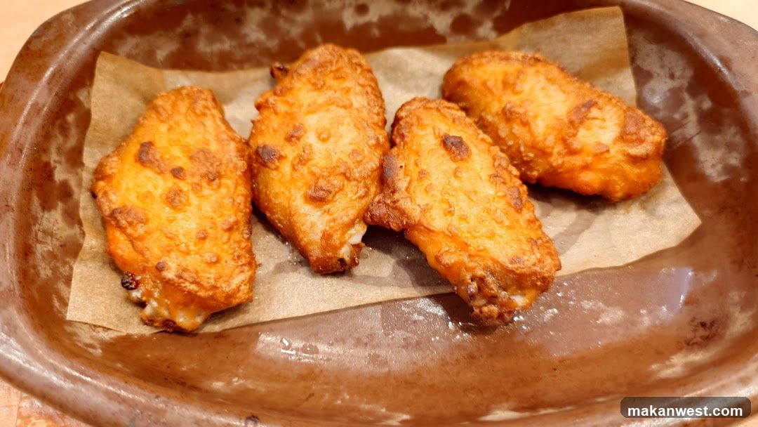 Fried Chicken Wings on Paper