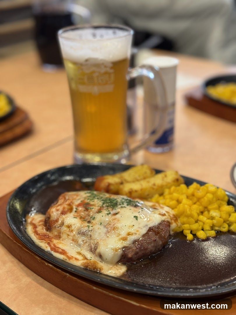 Steak with Melted Cheese and Corn on a Sizzling Plate