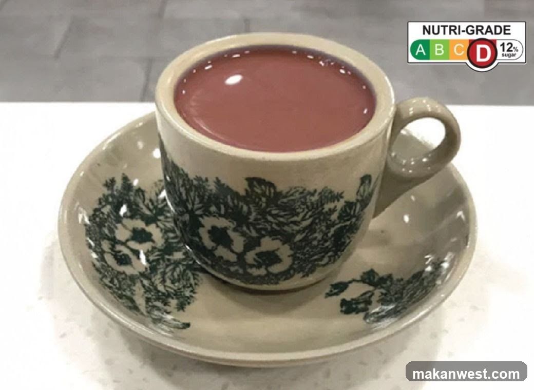 Cup of Red Drink with Nutri-Grade Label