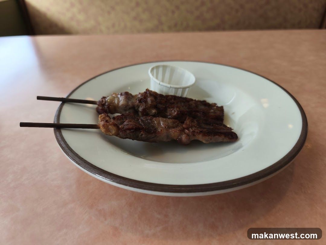 Grilled Meat Skewers on a Plate