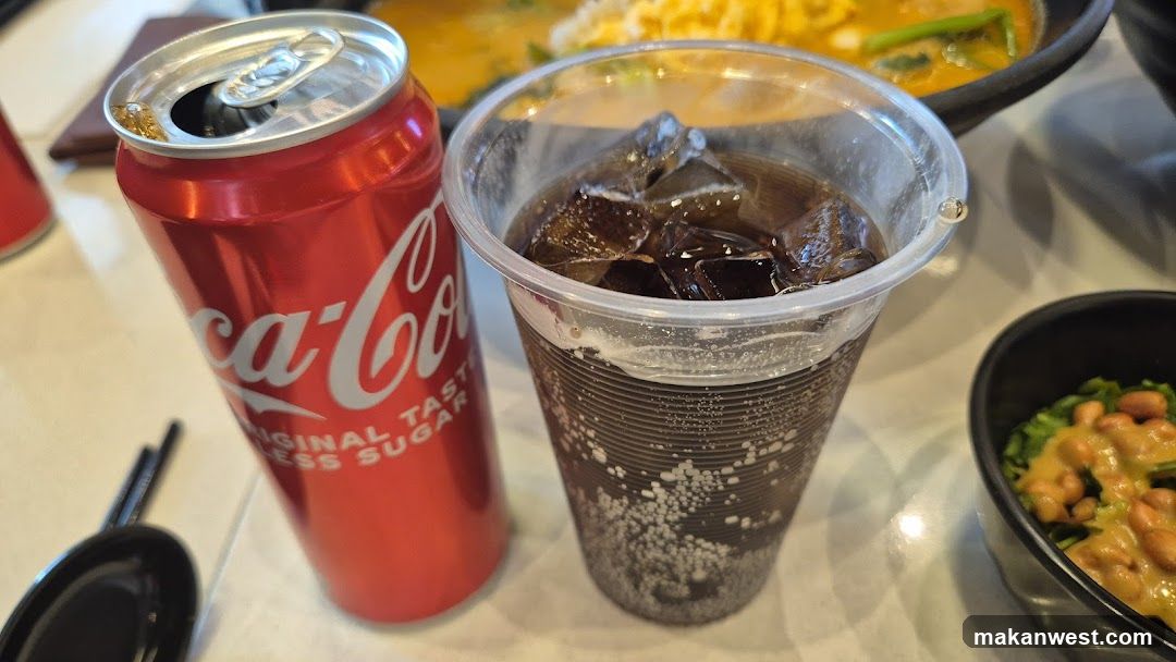 Coca-Cola and Iced Drink with Food
