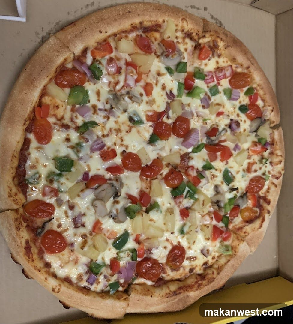 Pizza with Pineapple and Tomatoes