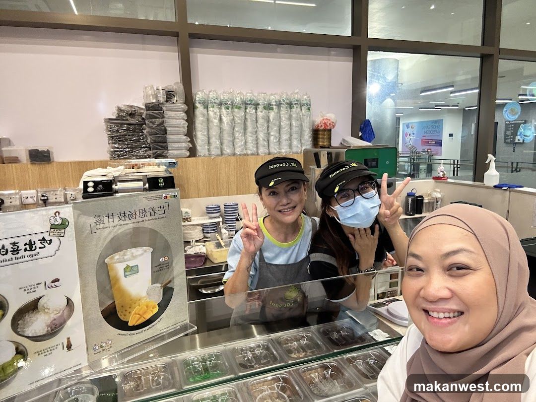 Boba Tea Shop Interior with Staff and Customer