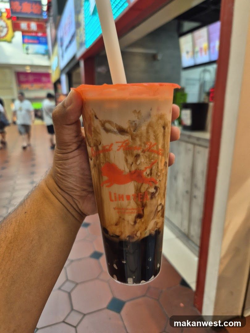 Boba Tea Cup in Mall Corridor