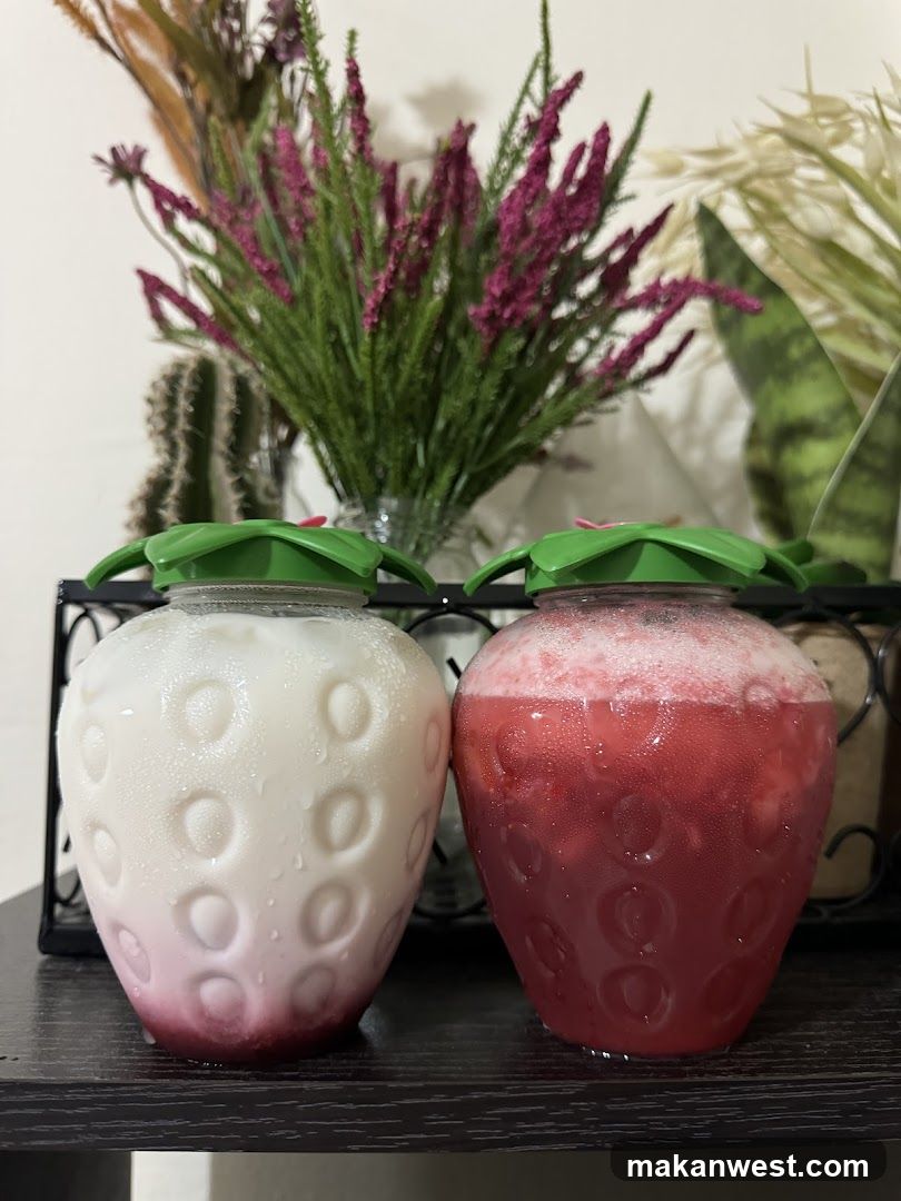 Strawberry-themed drinks in jars
