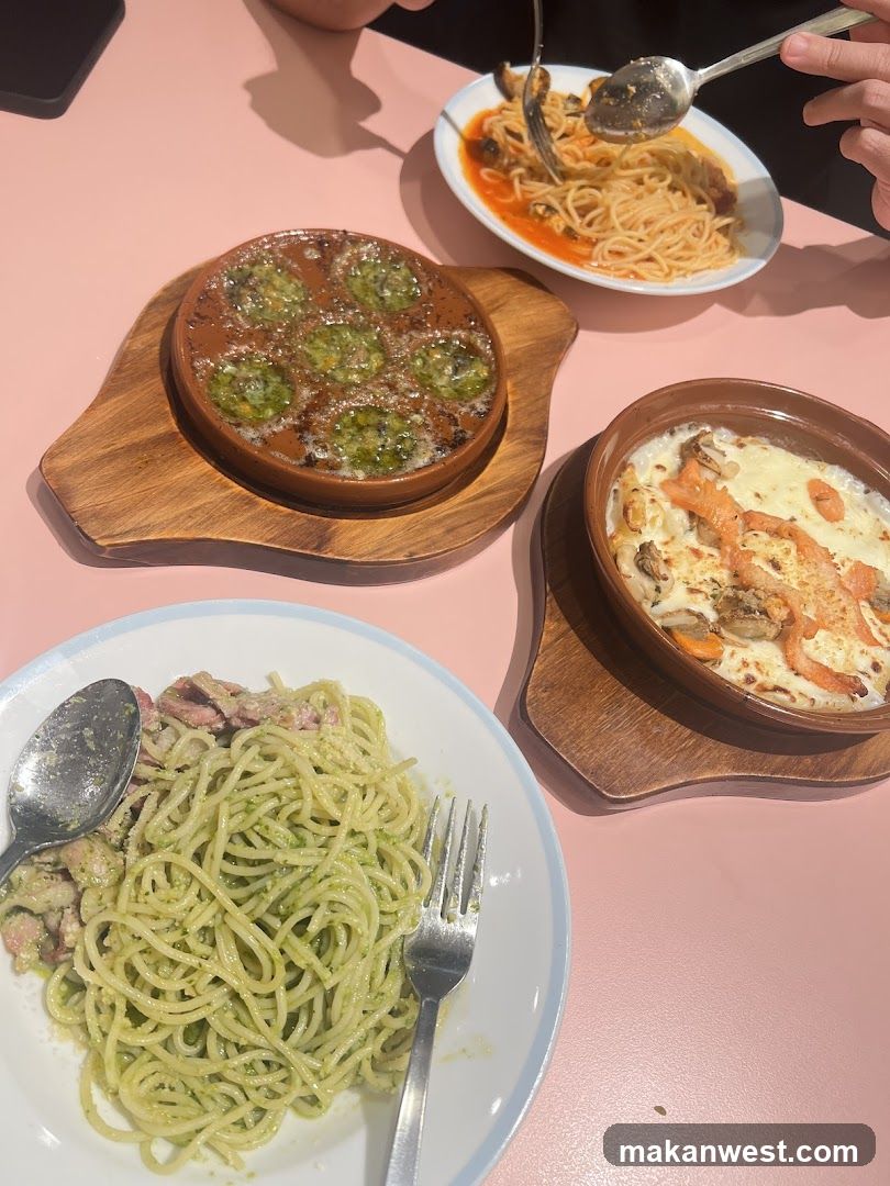 Pasta and Pizza Dishes on Pink Table