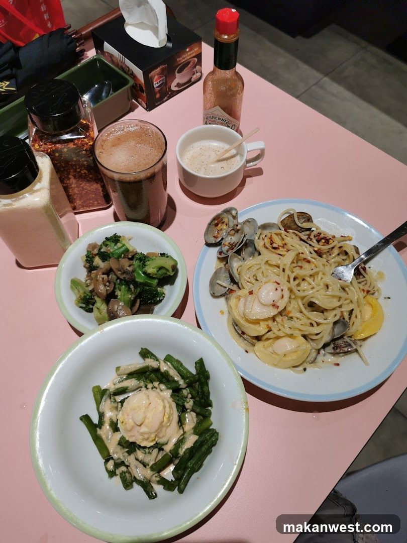 Dining Table with Pasta and Side Dishes