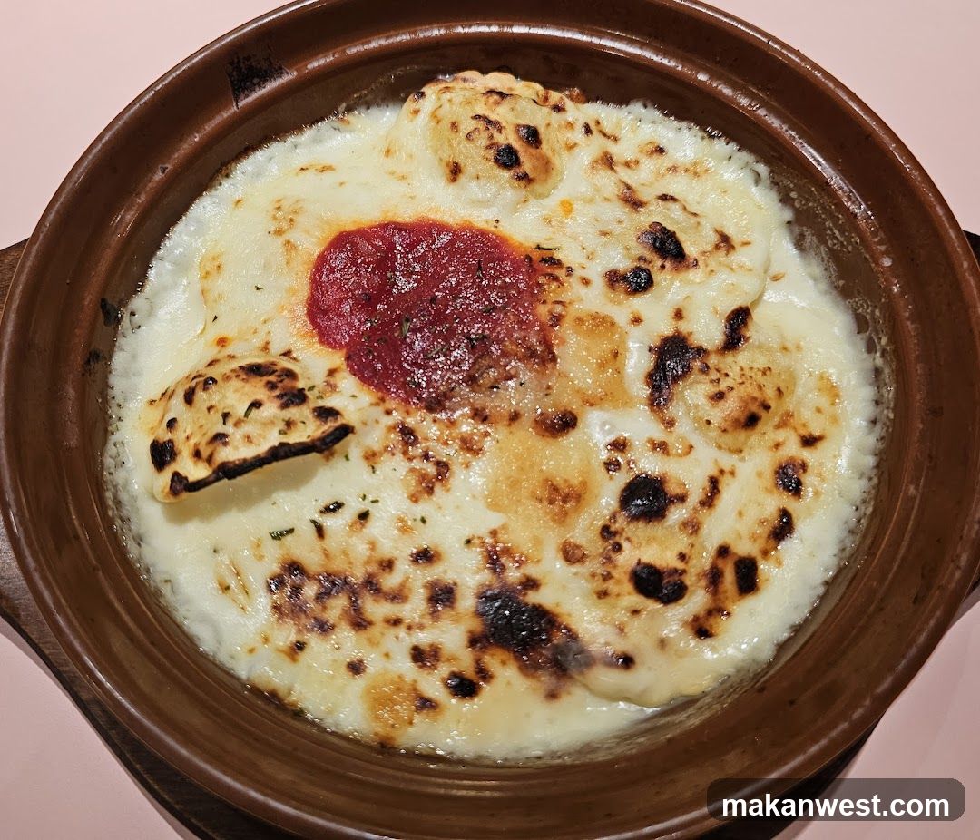 Baked Cheese Dish in Clay Pot