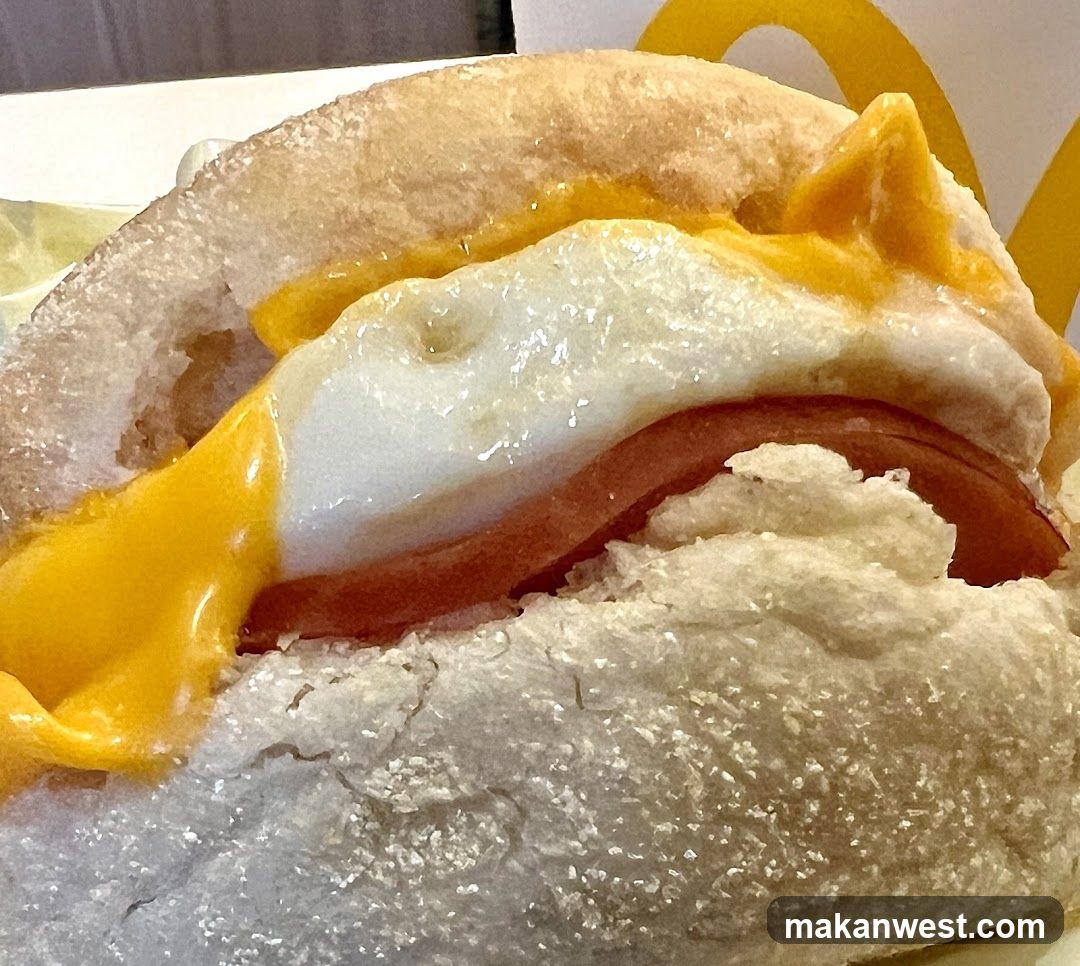Fried Egg Sandwich with Cheese and Tomato