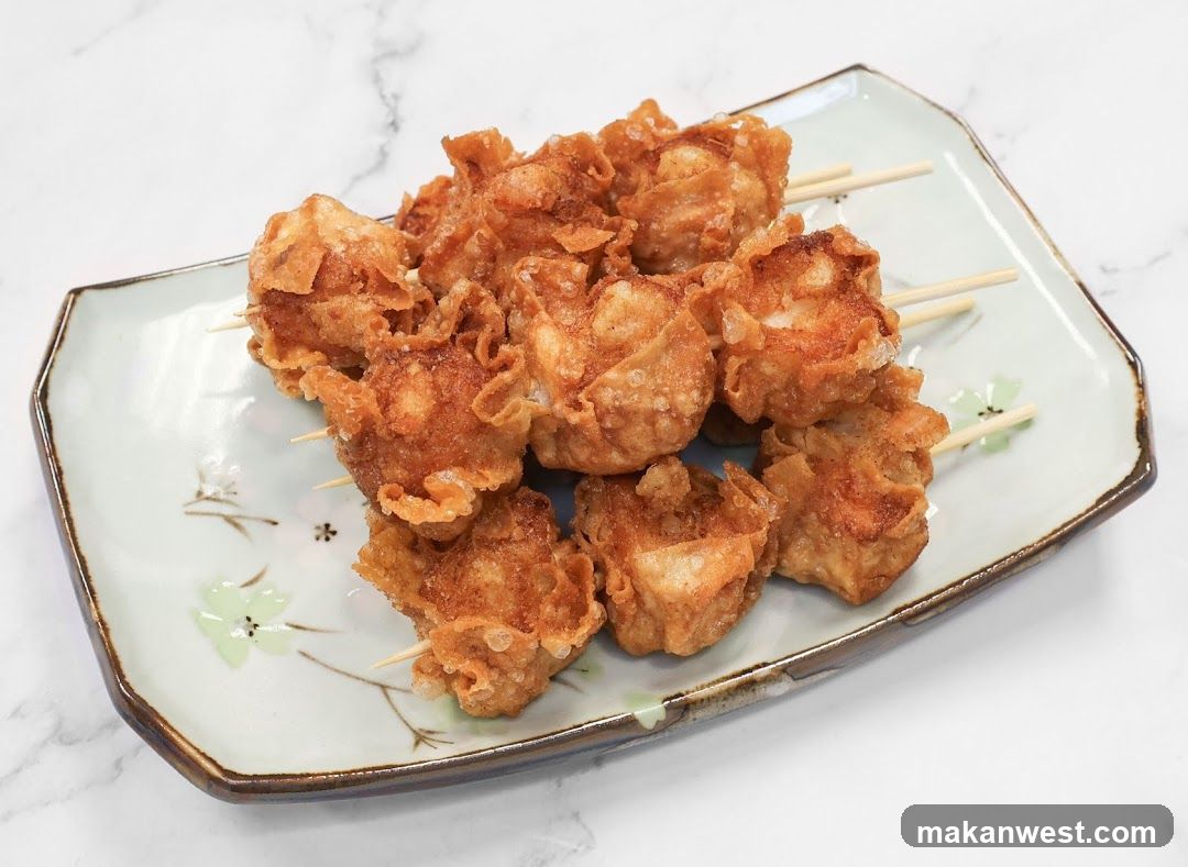 Fried Tempura Skewers on a Decorative Plate