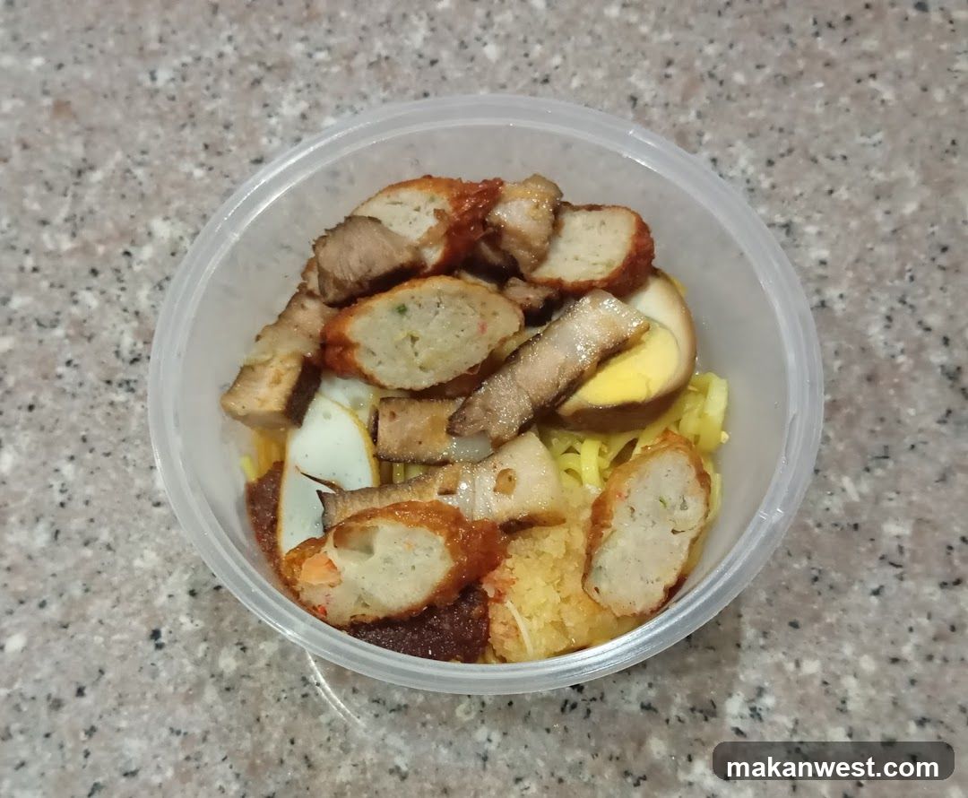 Bowl of Fried Meat and Egg with Noodles