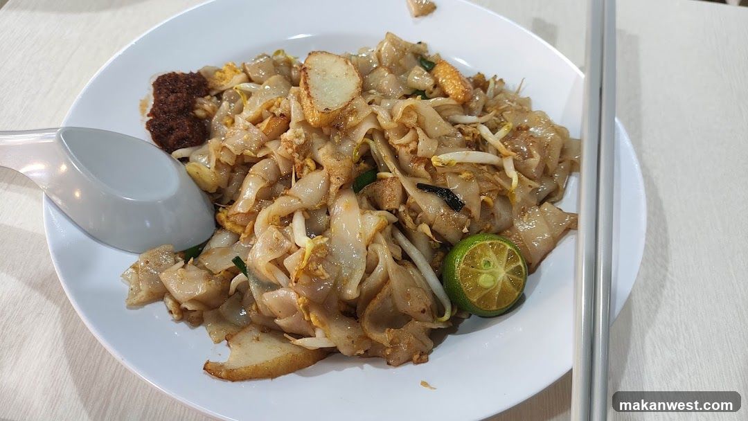Nasi Lemak or similar dish on a plate