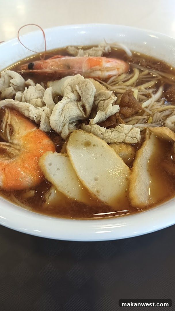 Bowl of Noodle Soup with Shrimp and Meat