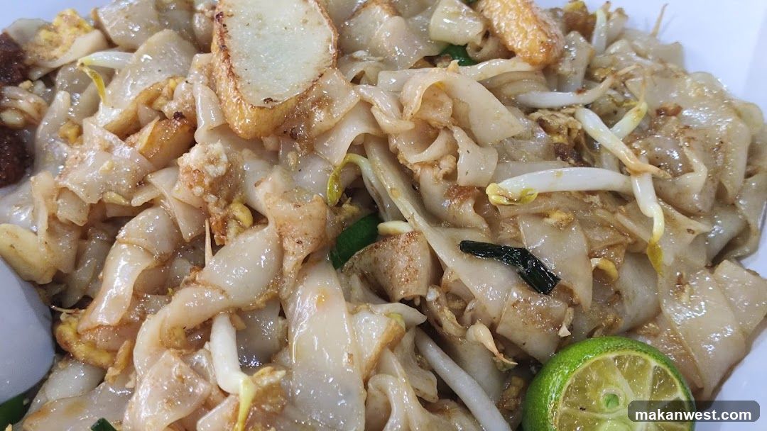 Pad See Ew or similar stir-fried noodles