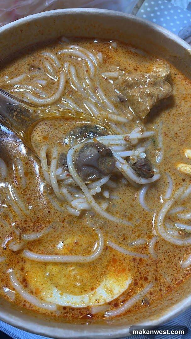 Spicy Noodle Bowl with Egg and Meatball