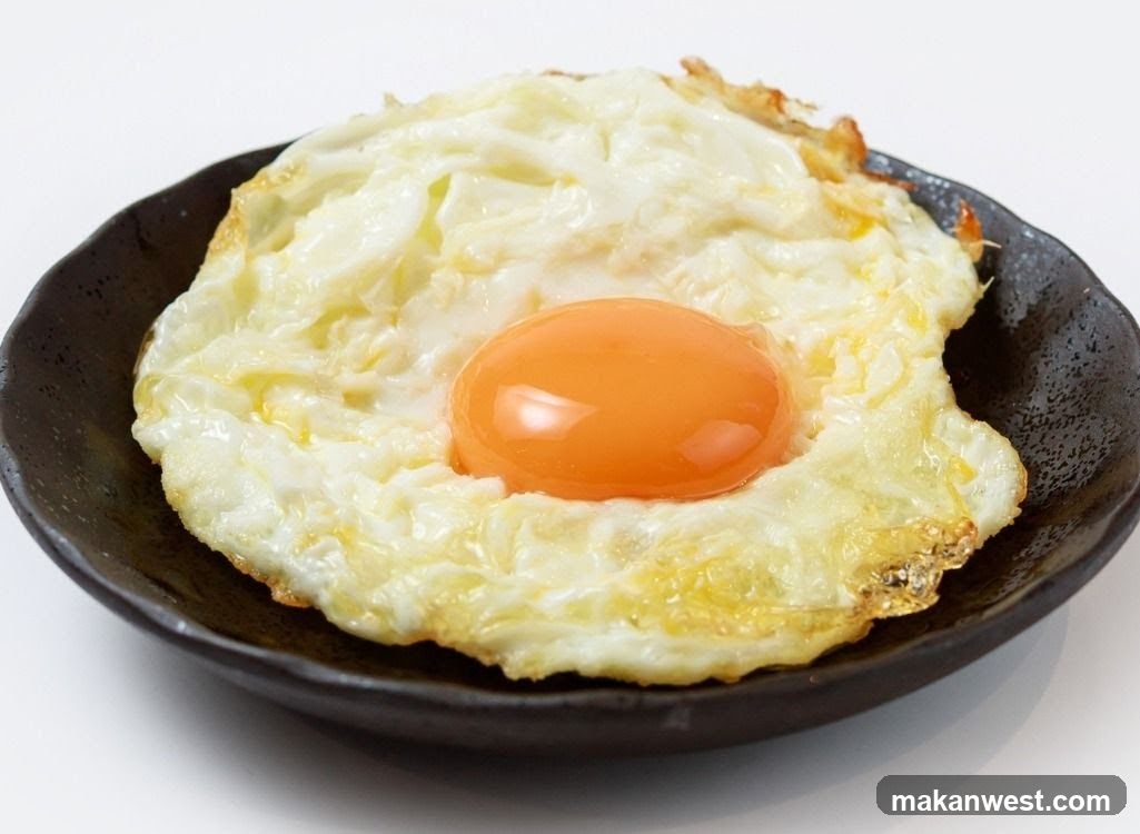 Fried Egg on Dark Plate