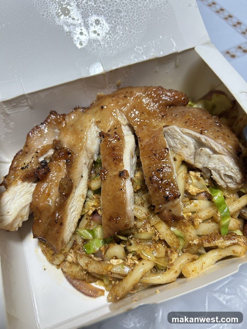 Sliced Chicken with Noodles in Takeout Box