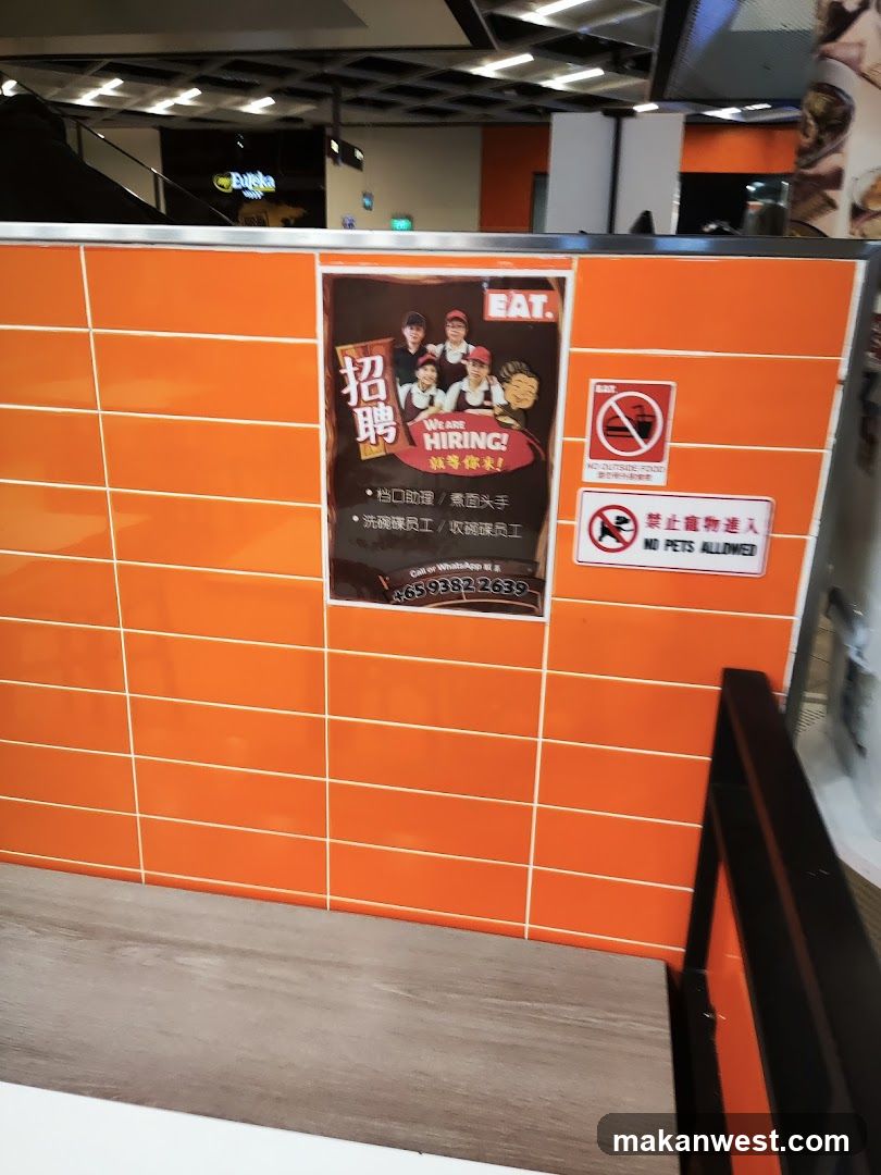 Hiring Poster and Signs on Orange Wall