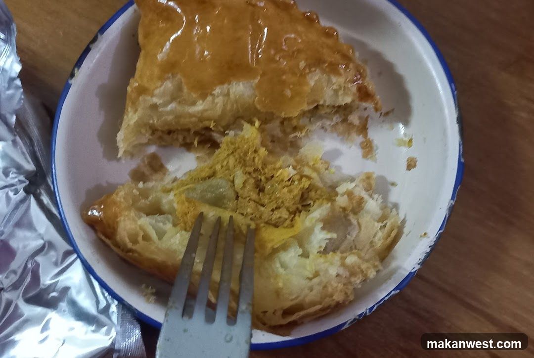 Baked pastry with fork