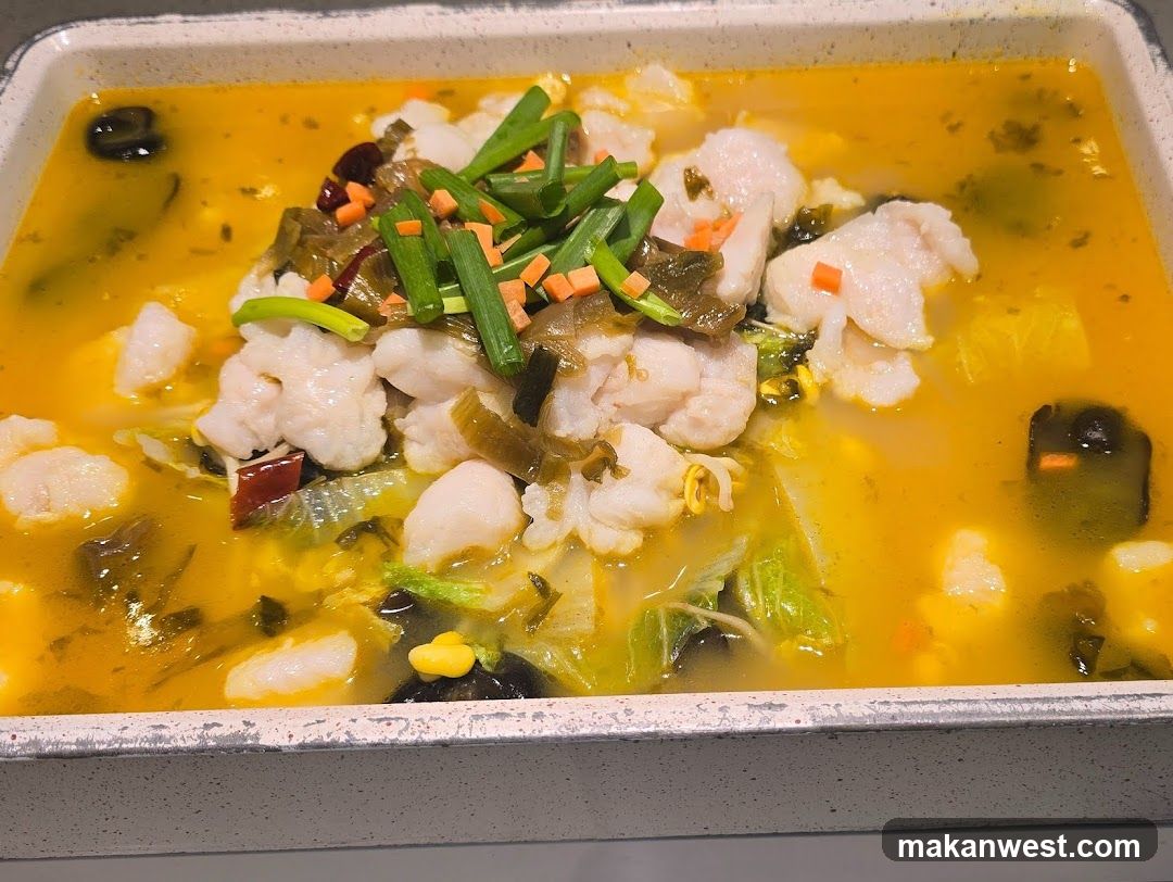 Spicy Fish Soup with Greens and Carrots