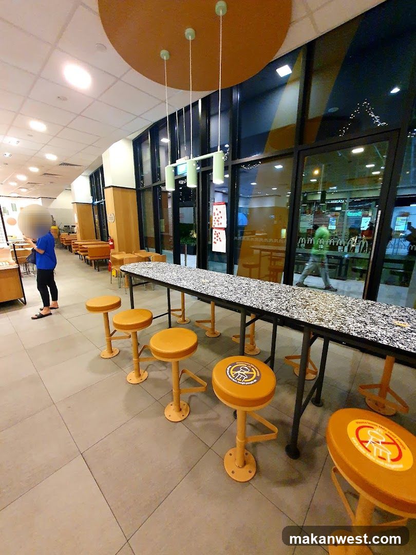 Dining Area with Long Tables and Stools