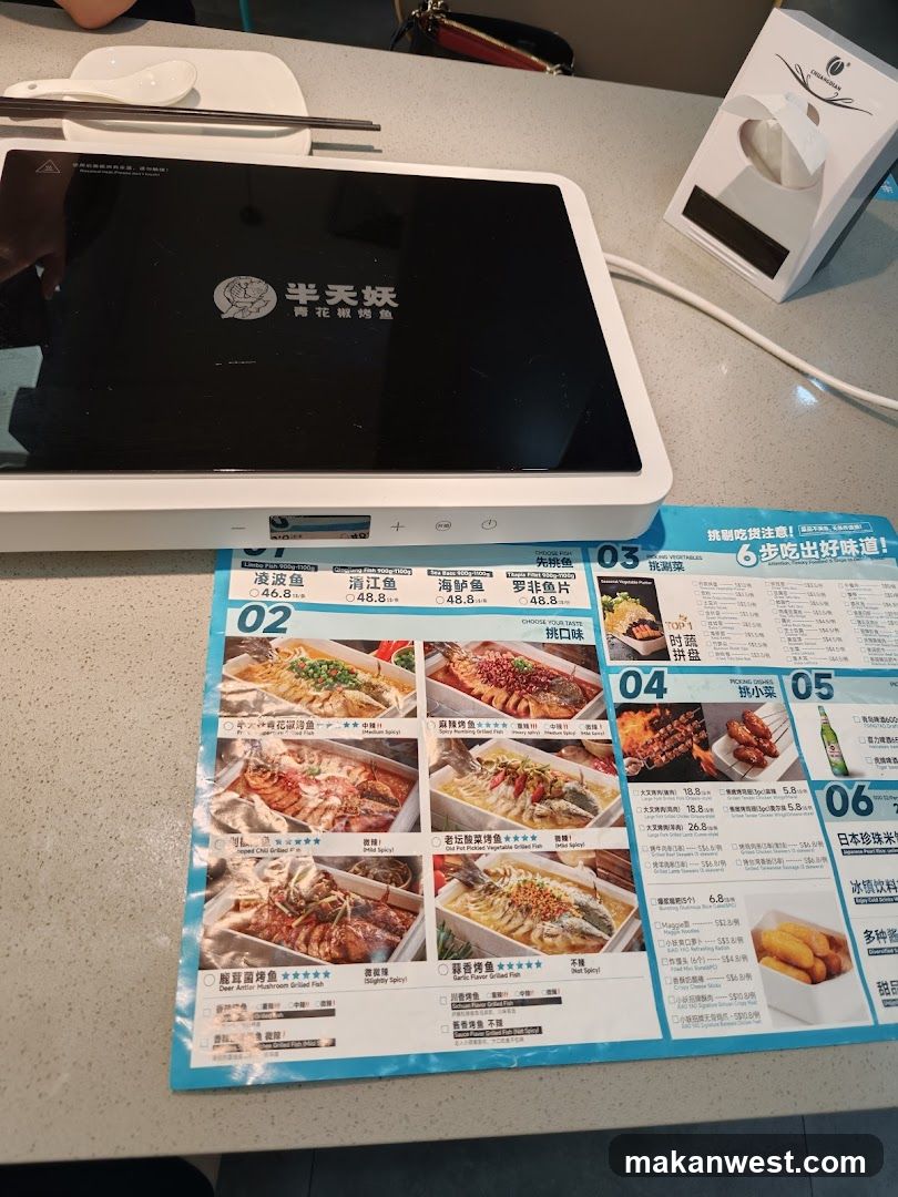 Restaurant Table Setting with Menu and Tablet