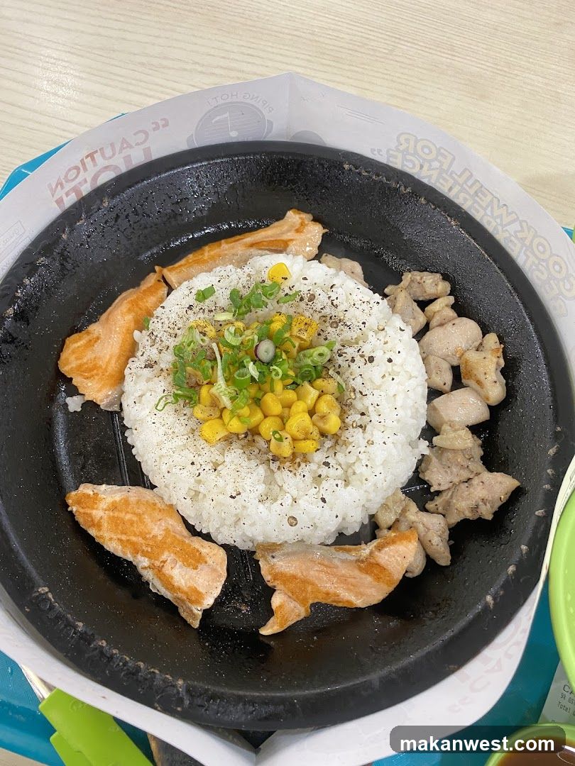 Sizzling Rice Bowl with Salmon and Chicken