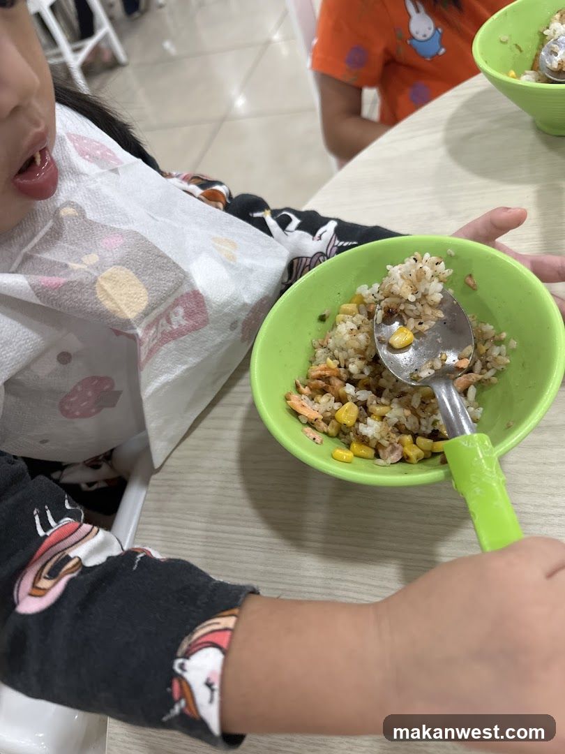 Child Eating Fried Rice