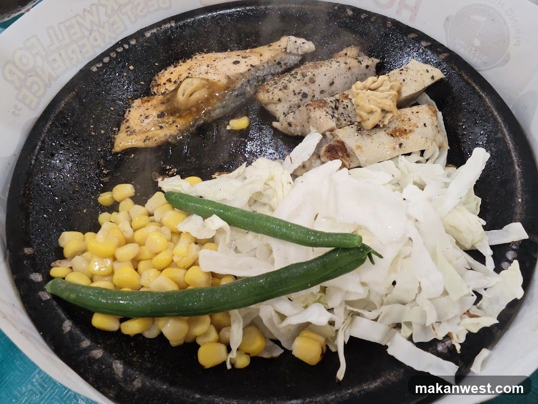 Grilled Chicken with Vegetables on Hot Plate