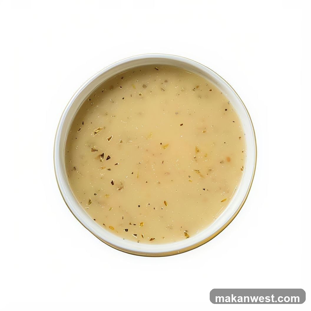 Bowl of creamy soup with herbs