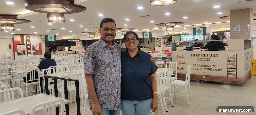 Food Court Interior with Staff and Customers