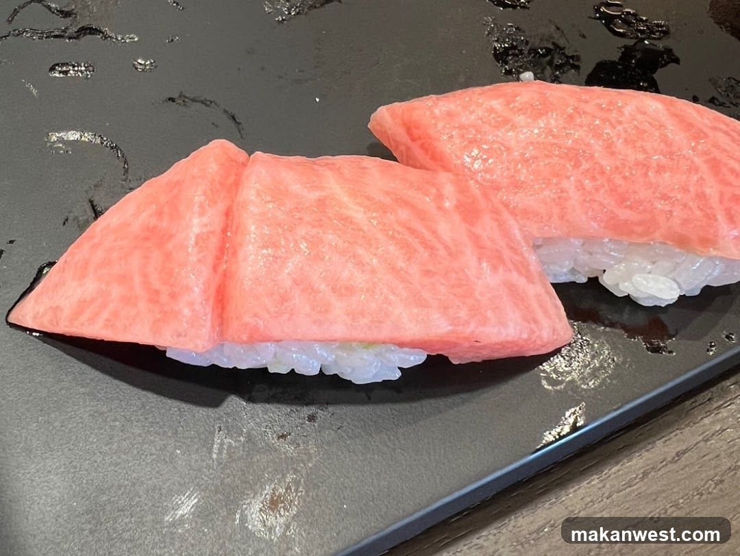 Sushi Nigiri on Black Plate