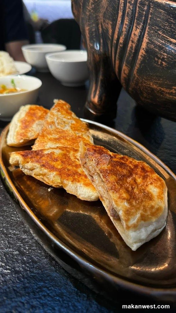 Pan-Fried Dumplings on a Plate