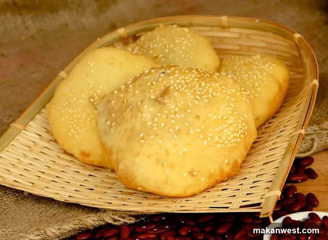 Sesame Seed Buns in Bamboo Basket