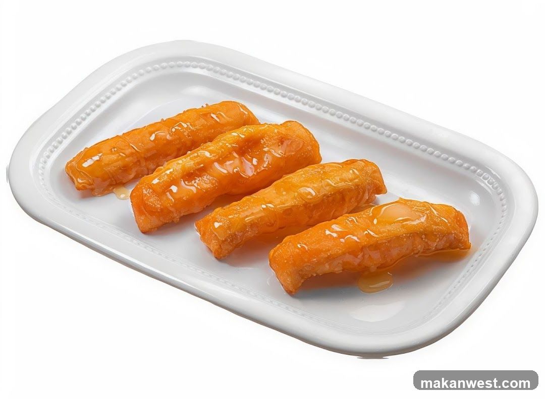 Glazed Sweet Rolls on a White Platter