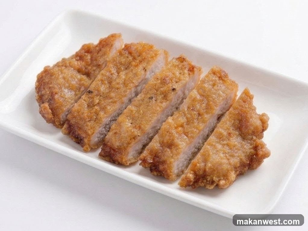 Fried Meat Slices on White Plate