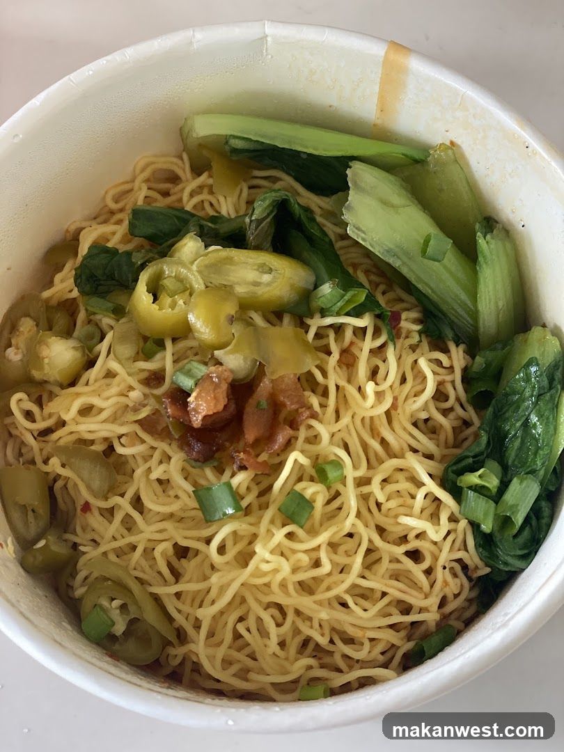 Bowl of Noodles with Vegetables and Peppers