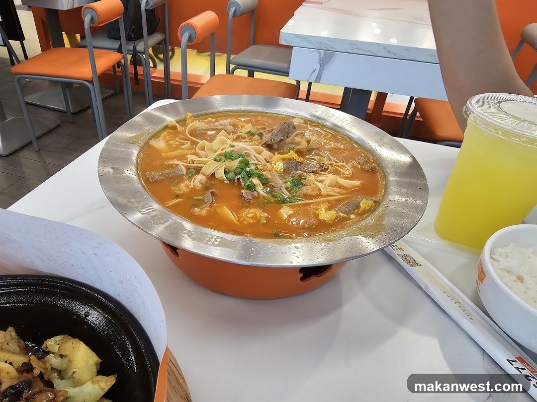 Dining Table with Hot Pot and Side Dishes