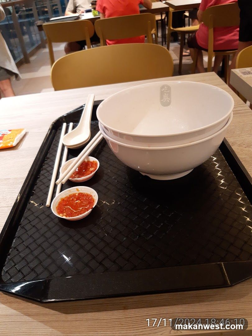 Bowl with condiments on tray