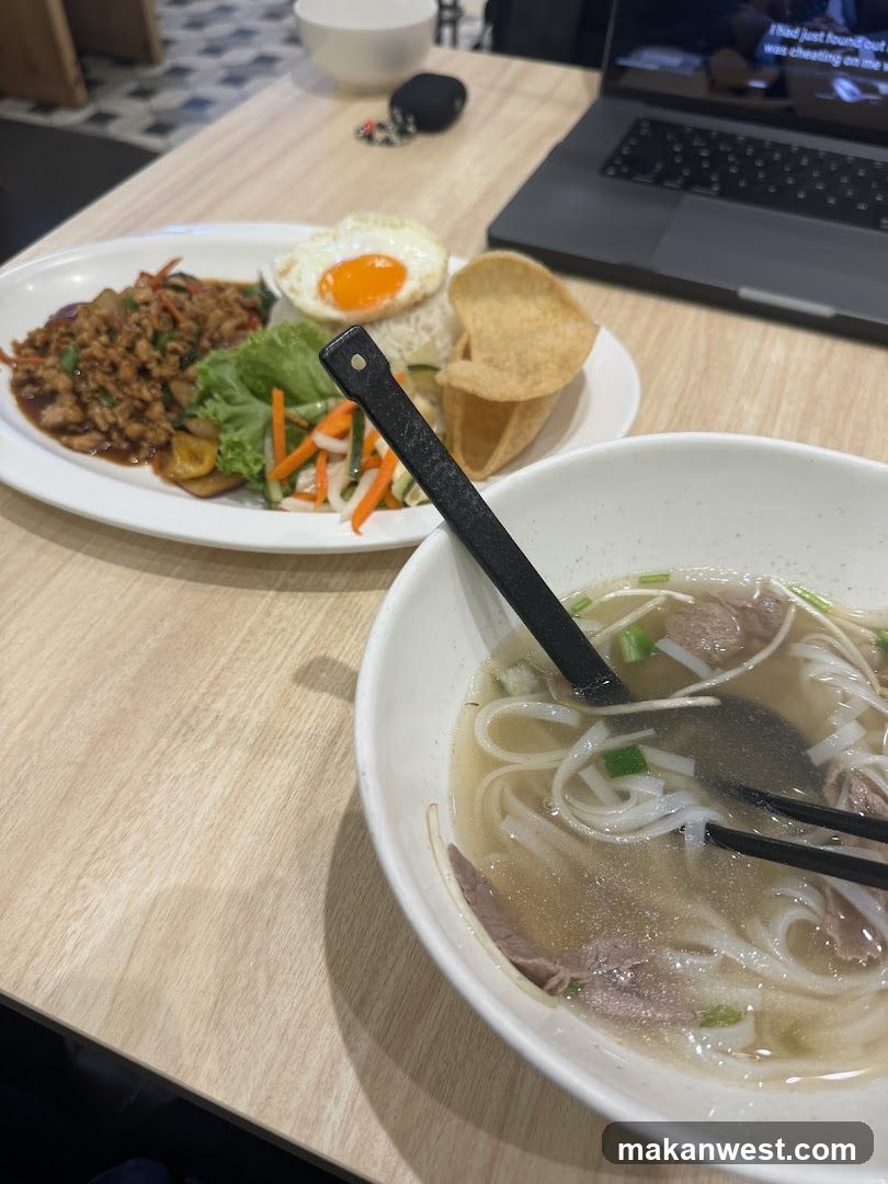 Food on table with laptop