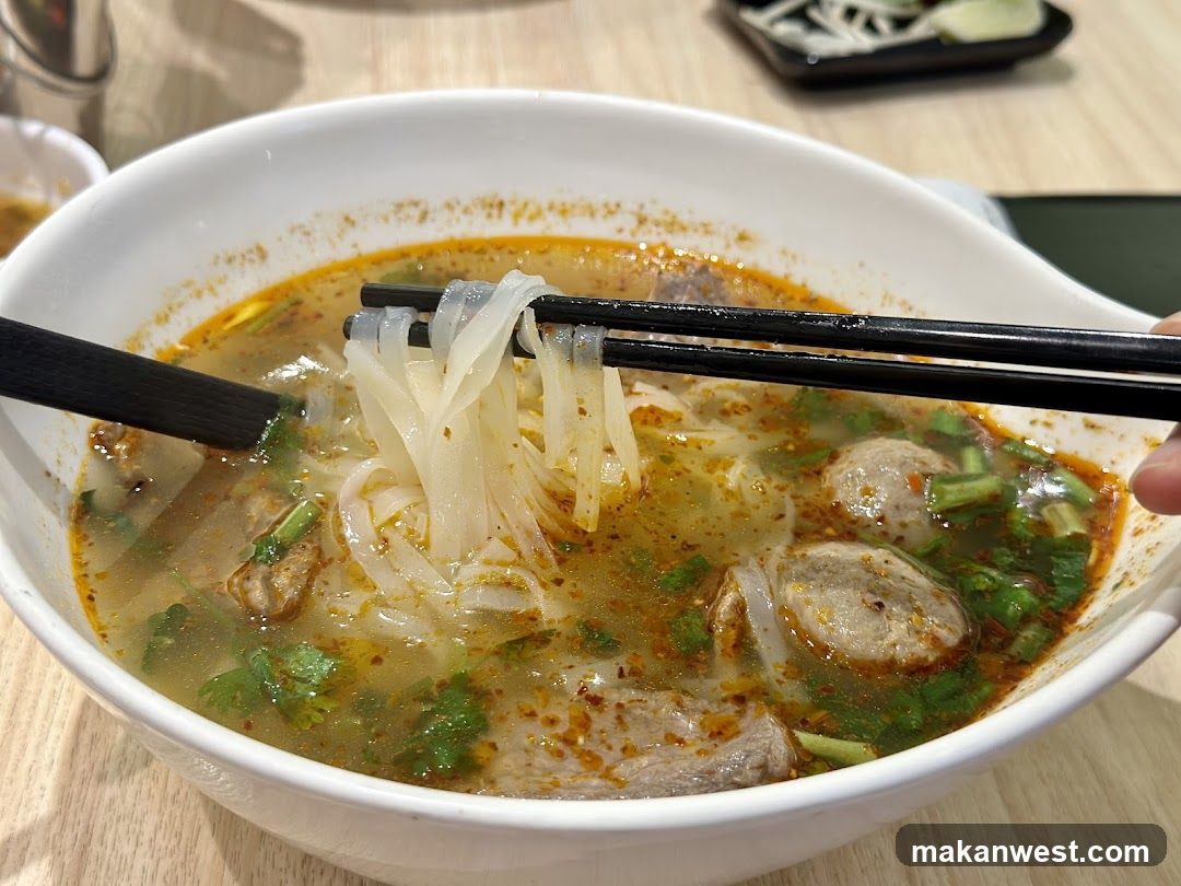 Bowl of Noodle Soup with Chopsticks